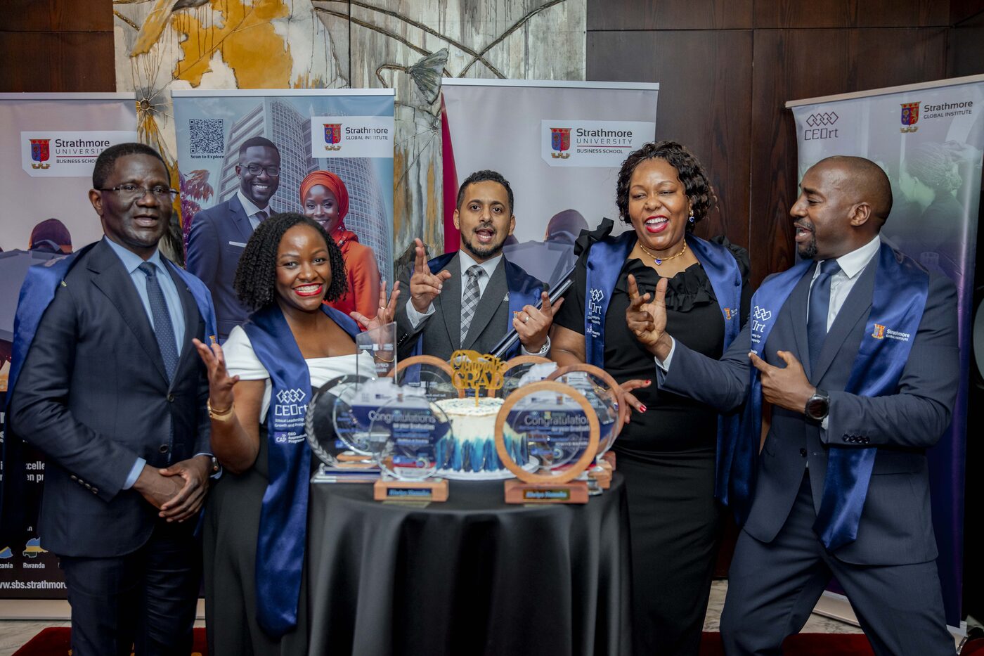 CAP graduates with their awards at the programme's graduation ceremony